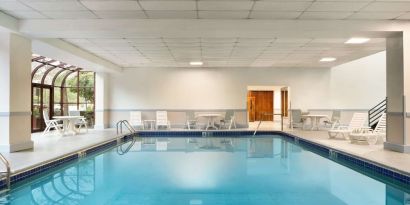 Indoor pool area at Hampton Inn New York - LaGuardia Airport.