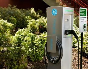 Car charging station and parking at Hampton Inn New York - LaGuardia Airport.