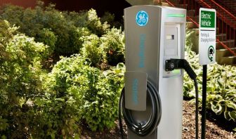 Car charging station and parking at Hampton Inn New York - LaGuardia Airport.