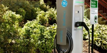 Car charging station and parking at Hampton Inn New York - LaGuardia Airport.