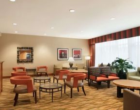 Lounge seating at Hampton Inn New York - LaGuardia Airport.