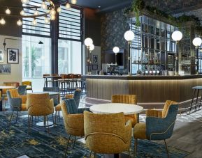 Hotel bar with comfortable seating, perfect for co-working at Leonardo Royal Hotel London Tower Bridge.