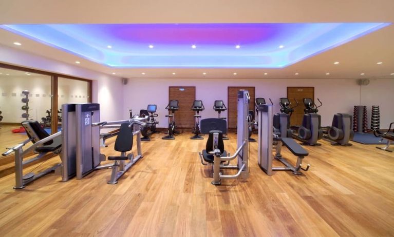 Fully equipped fitness center at Leonardo Royal Hotel London Tower Bridge.