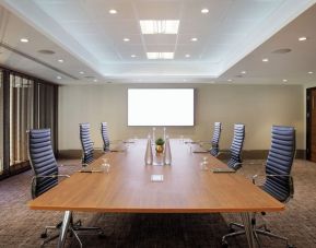 Professional meeting room with ergonomic chairs at Leonardo Royal Hotel London Tower Bridge.