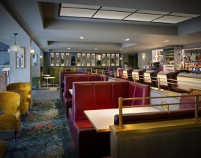 Hotel bar with comfortable seating, perfect for co-working at Leonardo Royal Hotel London City.