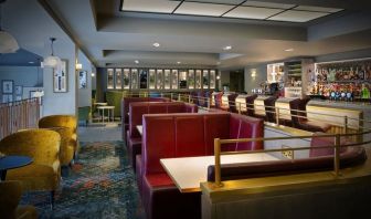 Hotel bar with comfortable seating, perfect for co-working at Leonardo Royal Hotel London City.