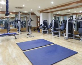 Fully equipped fitness center at Leonardo Royal Hotel London City.