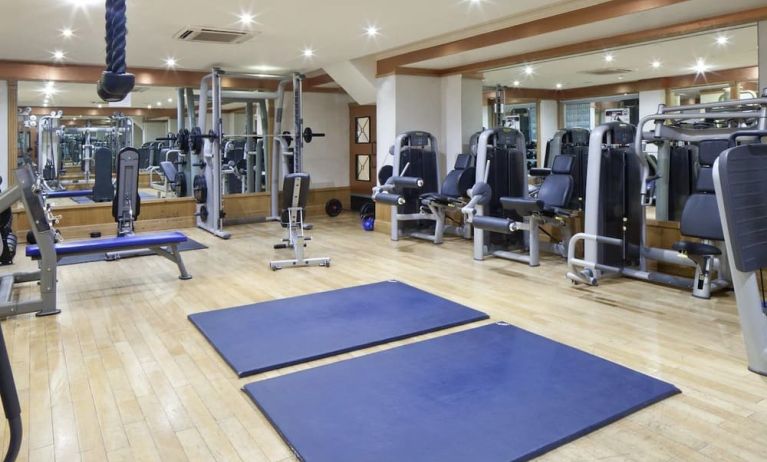 Fully equipped fitness center at Leonardo Royal Hotel London City.