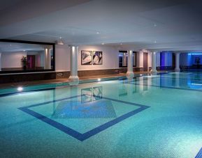 Indoor heated pool at Leonardo Royal Hotel London City.