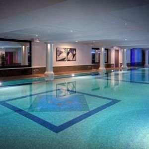 Indoor heated pool at Leonardo Royal Hotel London City.