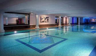 Indoor heated pool at Leonardo Royal Hotel London City.