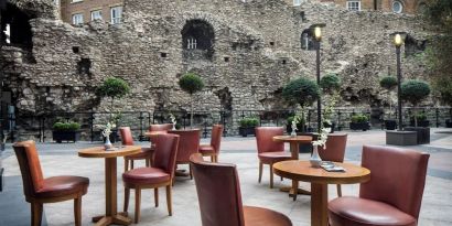 Beautiful hotel terrace with comfortable seating, perfect for co-working at Leonardo Royal Hotel London City.