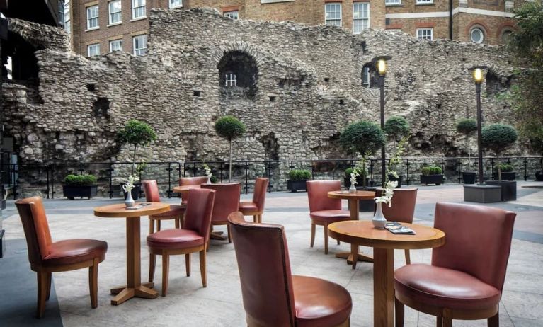 Beautiful hotel terrace with comfortable seating, perfect for co-working at Leonardo Royal Hotel London City.