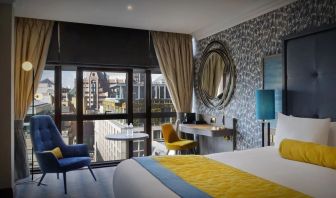 Day use room with work desk at Leonardo Royal Hotel London City.