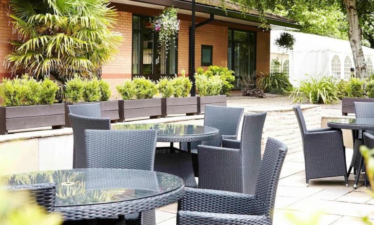 Hotel terrace with comfortable seating at Novotel Manchester West.