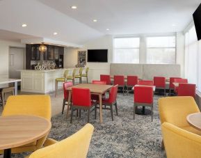 Dining area perfect for coworking at Hilton Garden Inn Queens/JFK Airport.