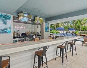 Poolside bar which also serves breakfast, lunch, and dinner at The Sagamore Hotel South Beach.