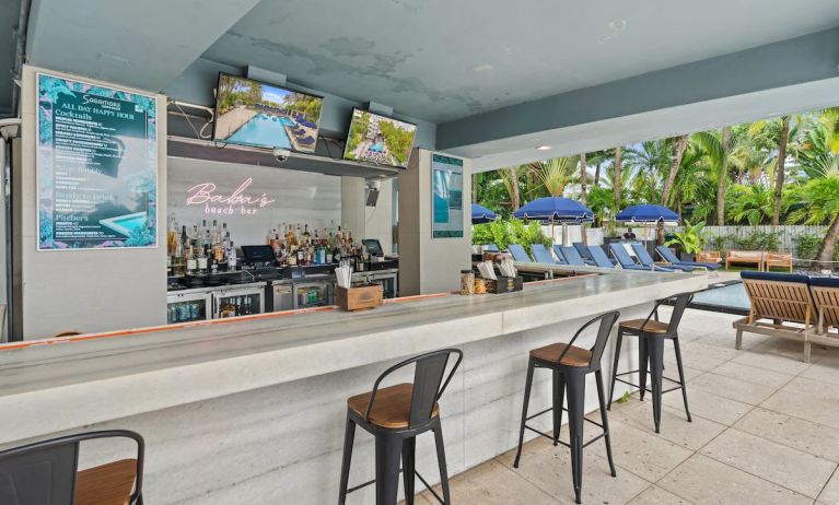 Poolside bar which also serves breakfast, lunch, and dinner at The Sagamore Hotel South Beach.