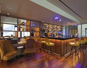 Hotel bar at Tower Suites By Blue Orchid Hotels.