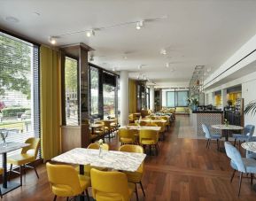 Dining area at Tower Suites By Blue Orchid Hotels.