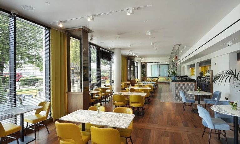 Dining area at Tower Suites By Blue Orchid Hotels.