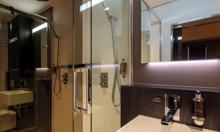 Guest bathroom with shower at Bloc Hotel Birmingham.