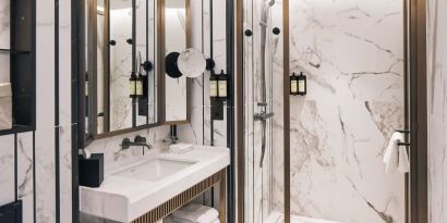 Guest bathroom with shower and free toiletries at Page8, Page Hotels.