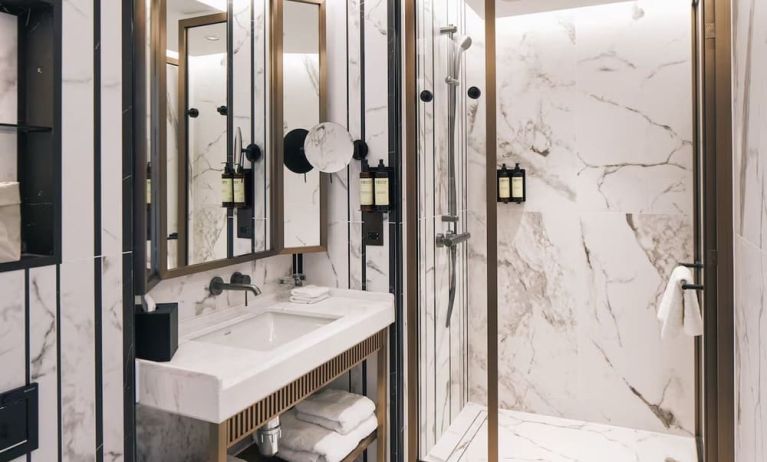 Guest bathroom with shower and free toiletries at Page8, Page Hotels.