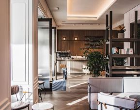 Hotel coffee shop with comfortable seating at Page8, Page Hotels.