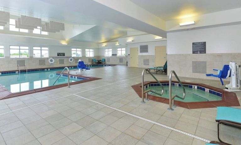 Indoor pool and spa tub at Residence Inn Champaign.