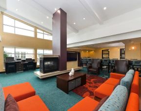 Lobby and coworking lounge at Residence Inn Champaign.