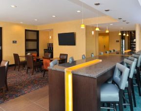 Dining area perfect for coworking at Residence Inn Champaign.