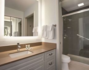 Guest bathroom with shower at Hyatt House Pleasant Hill.