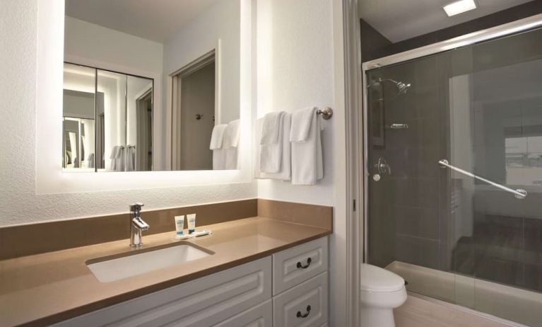 Guest bathroom with shower at Hyatt House Pleasant Hill.