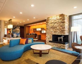 Lobby and coworking lounge at Fairfield Inn And Suites Cambridge Ohio.