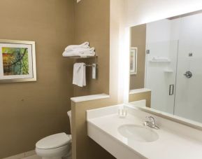 Guest bathroom with shower at Fairfield Inn And Suites Cambridge Ohio.