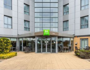 Hotel entrance with exterior lounge seating at Ibis Styles Barnsley.