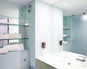 Guest bathroom with shower and free toiletries at Ibis Styles Barnsley.