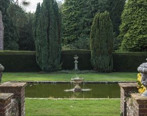 Beautiful garden with fountain at Barnett Hill Hotel.