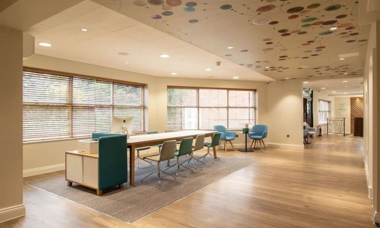 Business center with computer, printer and ergonomic chairs at Holiday Inn Leicester-Wigston.