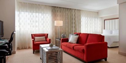 Day use room with sofa and work desk at Renaissance Newark Airport Hotel.