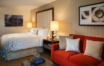 Day use room with sofa at Renaissance Newark Airport Hotel.