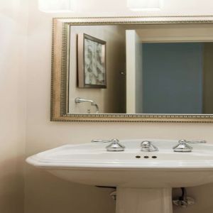 Guest bathroom with shower at Renaissance Newark Airport Hotel.