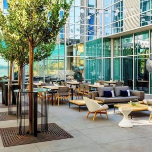 Al fresco dining with ample seats at AC Hotel By Marriott SFO/Oyster Point Waterfront.