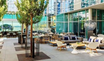 Al fresco dining with ample seats at AC Hotel By Marriott SFO/Oyster Point Waterfront.