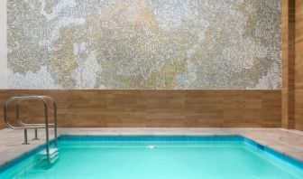 Refreshing indoor pool at AC Hotel By Marriott SFO/Oyster Point Waterfront.