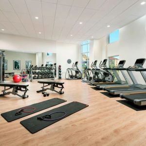 Fully equipped fitness center at AC Hotel By Marriott SFO/Oyster Point Waterfront.