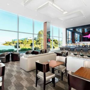 Lounge and coworking area at AC Hotel By Marriott SFO/Oyster Point Waterfront.