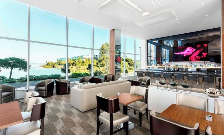 Lounge and coworking area at AC Hotel By Marriott SFO/Oyster Point Waterfront.