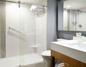 Guest bathroom with shower at Hyatt Place Jacksonville / St. Johns Town Center.